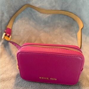Michael Kors Genuine Pebbled Leather Magenta Belt Bag size L/XL in EUC.
